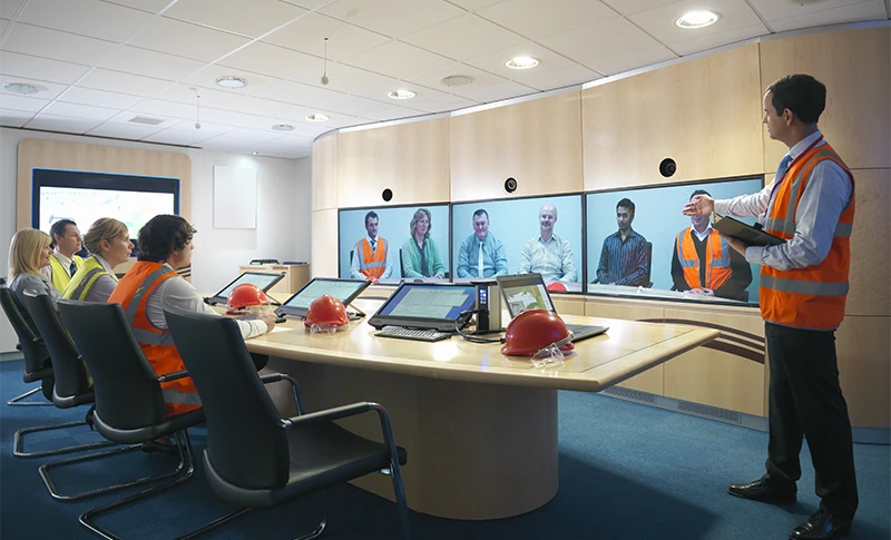 Construction workers in video conference